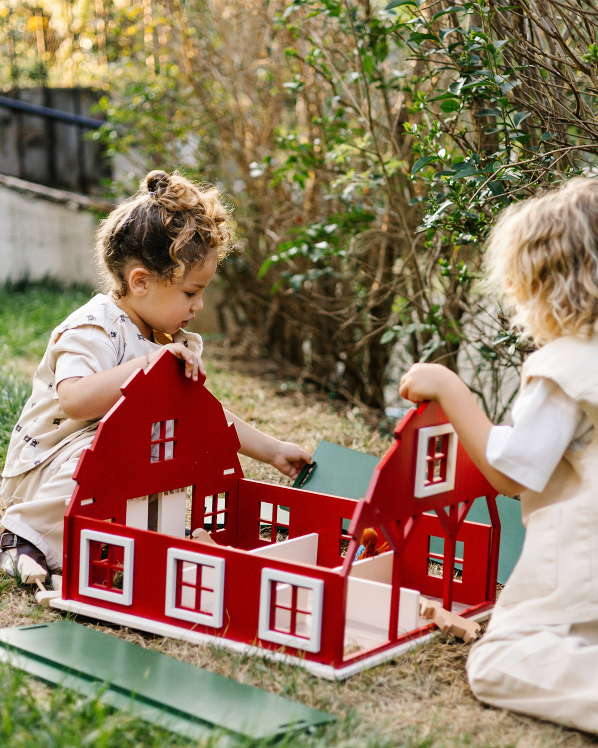 Wooden vs. Plastic Dollhouses: Which One Is Better for Your Child?