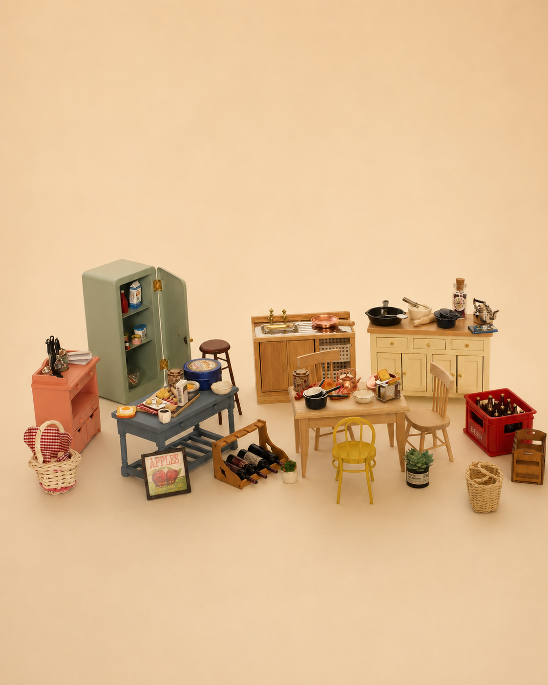 A miniature dollhouse kitchen and dining room set arranged on a warm beige background. The set includes a light green refrigerator, a pink dresser, a gray table with a blue pot, a wooden dining table and chairs, a small kitchen counter with a sink, a red crate, and other tiny furniture and decor pieces.
