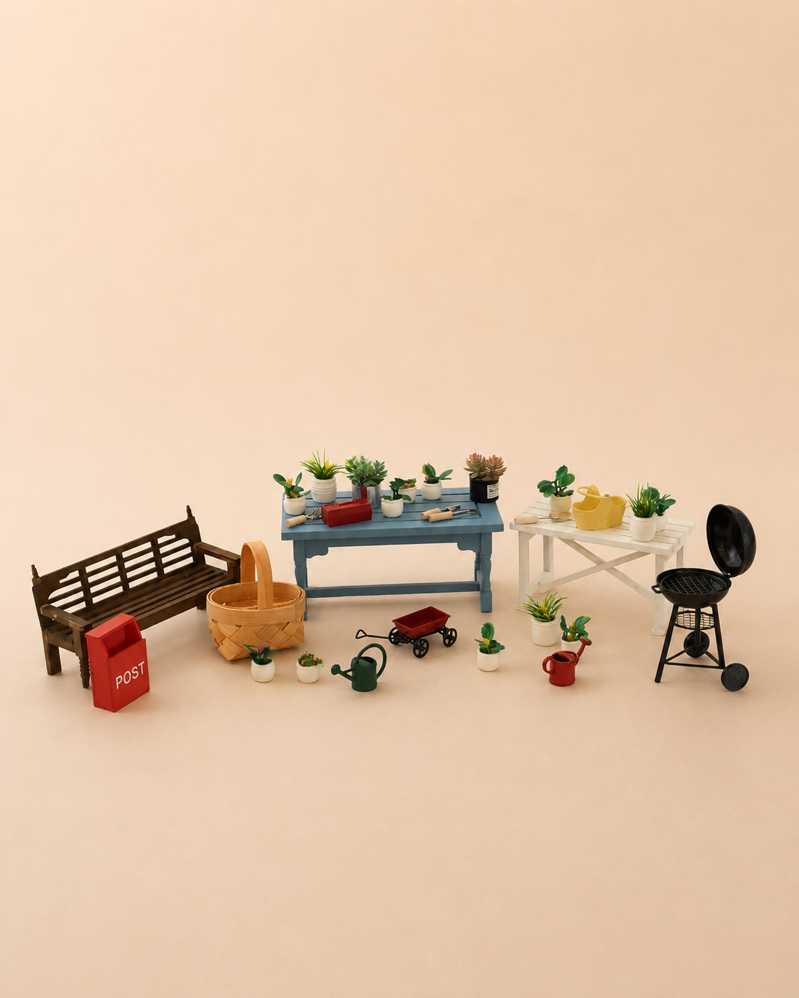 A miniature dollhouse outdoor scene with a brown bench, red mailbox, blue table with potted plants, white table with yellow chairs, black grill, and small garden accessories on a beige background.