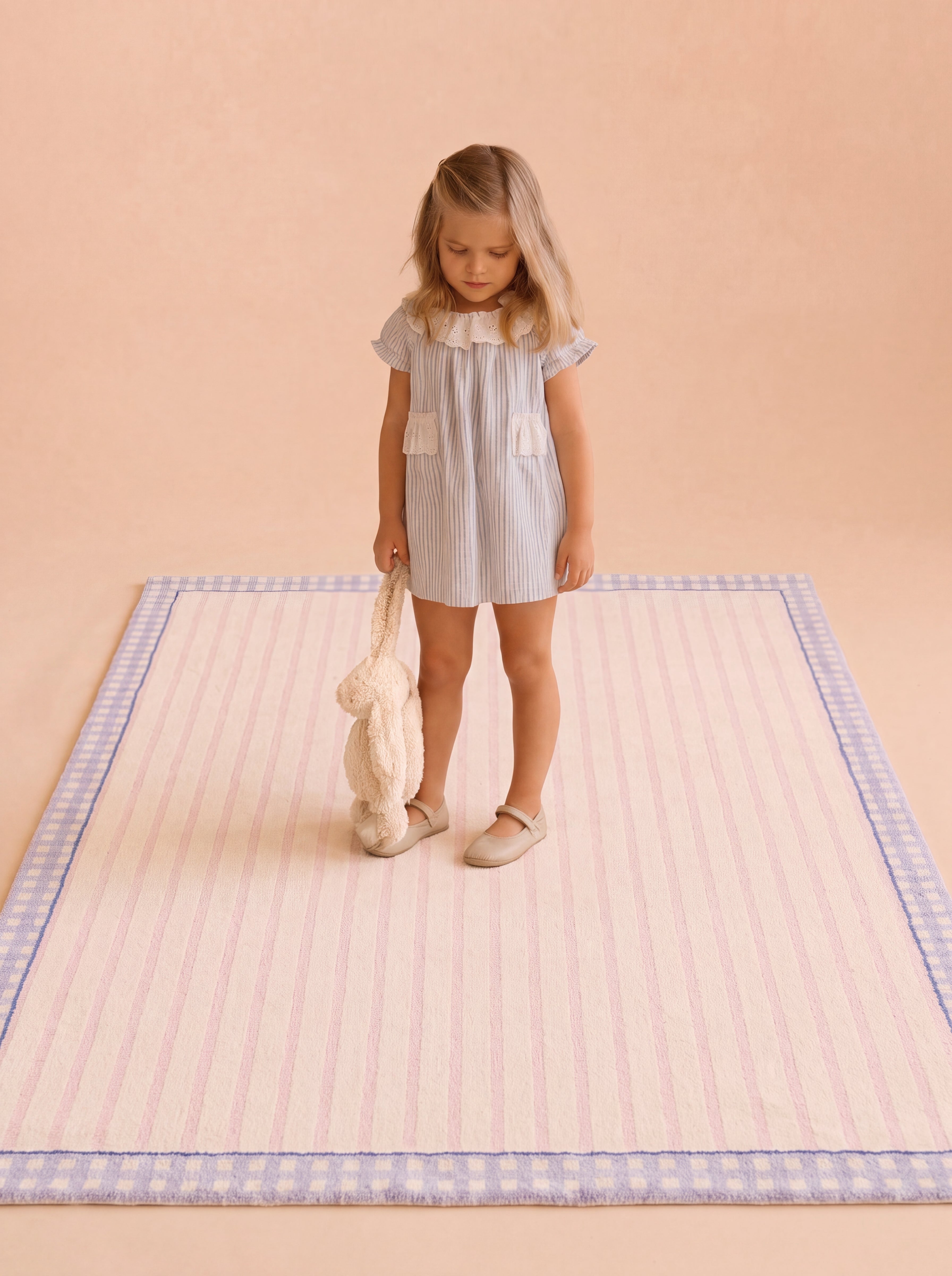 The Gingham rug in a soft studio setting.