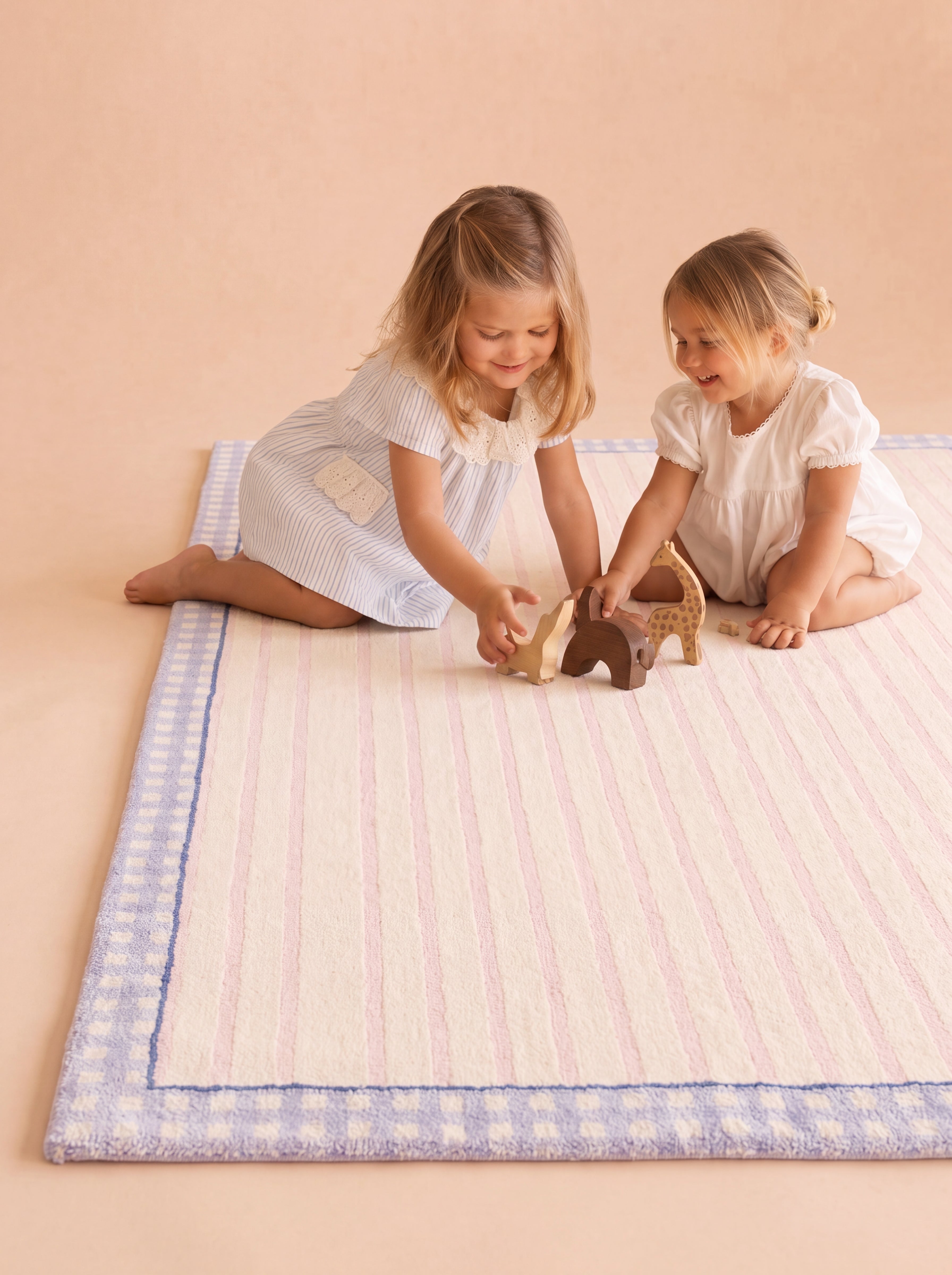 Playtime on a soft rug with wooden toys.