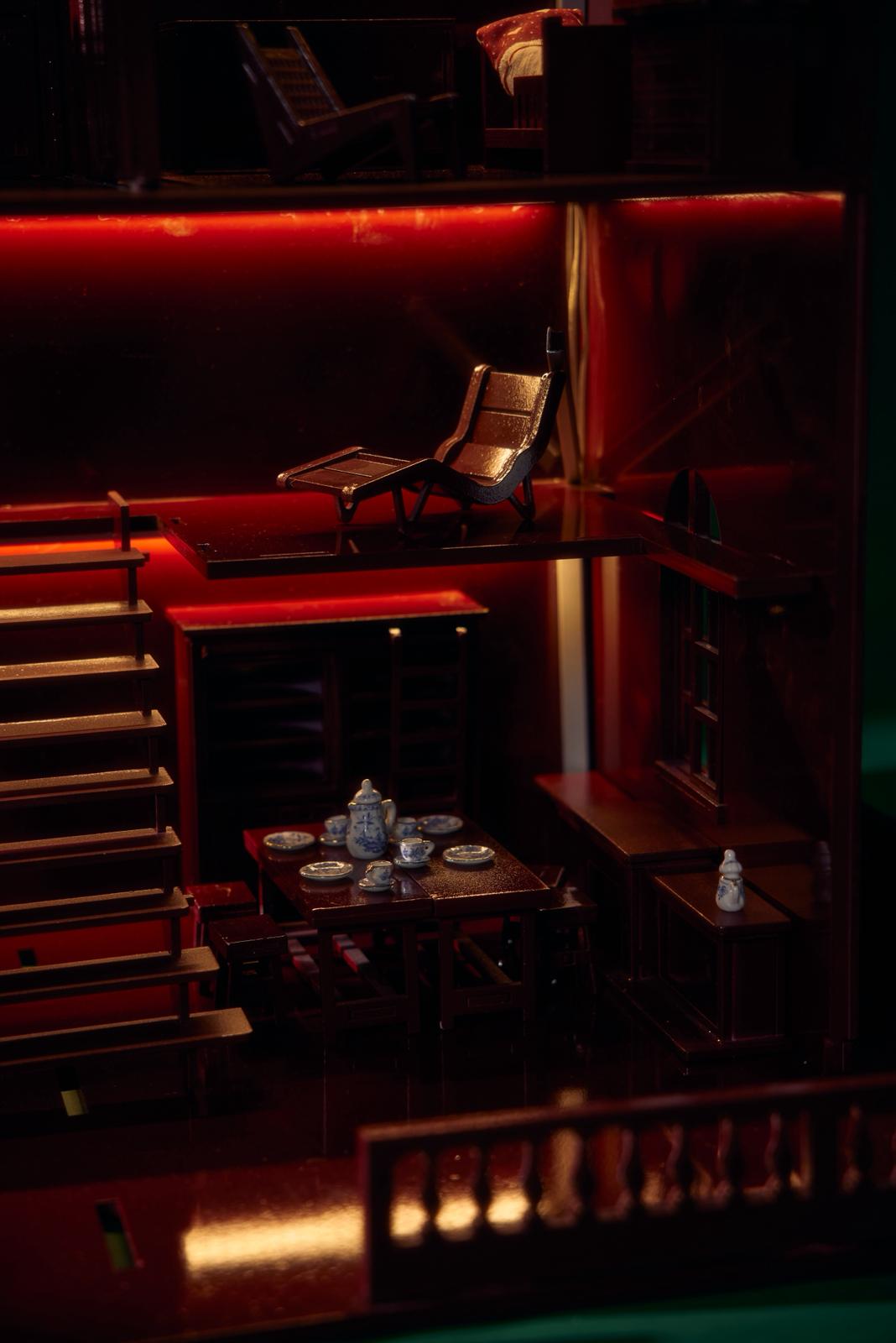 Little Forest Animals House of Bordeaux Christmas scene — miniature wooden dining room with teddy bears sharing dinner under soft LED light, handcrafted dollhouse décor symbolizing warmth and family