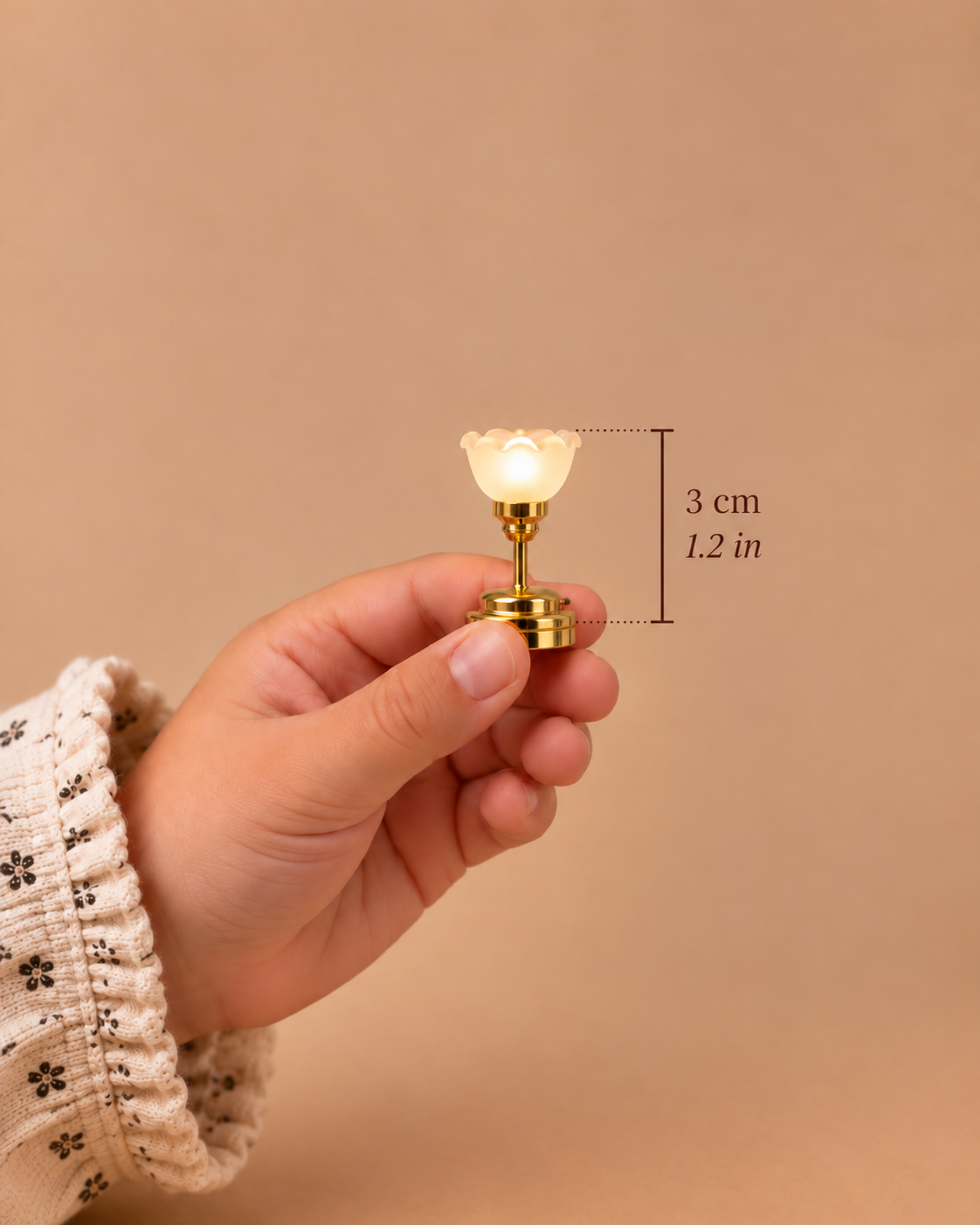 A 3 cm wall light with a polished gold finish and softly glowing frosted glass shade, designed for 1:12 scale dollhouse interiors